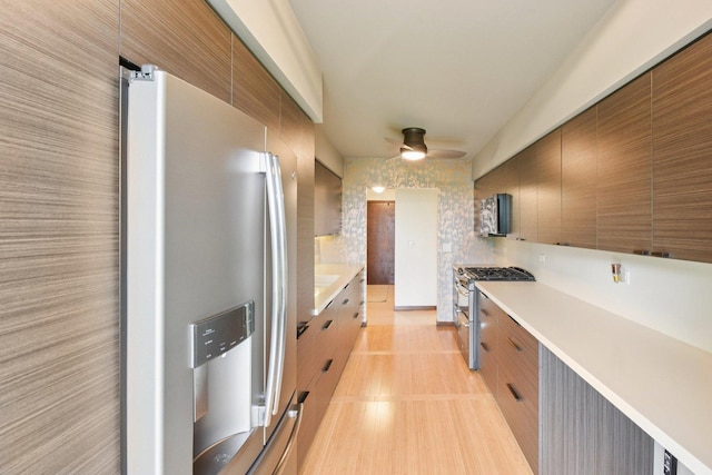 1S150 Spring Rd Unit 5F, Oakbrook Terrace, IL 60181 - kitchen with appliances with stainless steel finishes, a ceiling fan, light countertops, and modern cabinets