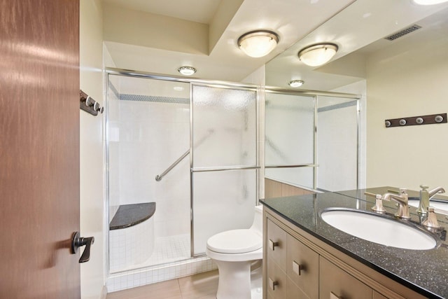 1S150 Spring Rd Unit 5F, Oakbrook Terrace, IL 60181 - full bath featuring toilet, vanity, a stall shower, and tile patterned flooring