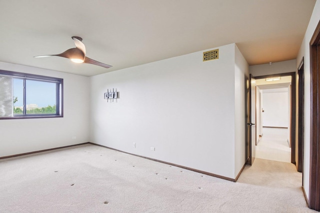 1S150 Spring Rd Unit 5F, Oakbrook Terrace, IL 60181 - carpeted spare room with a ceiling fan and baseboards