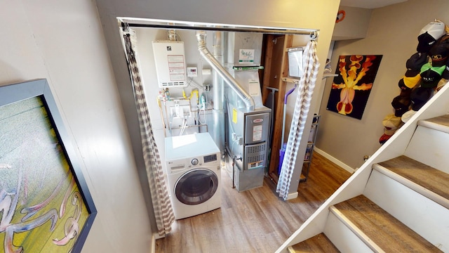 130 Syril Dr, Geneva, IL 60134 - laundry area with washer / clothes dryer, wood finished floors, and water heater