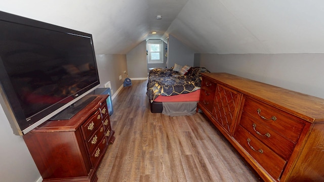130 Syril Dr, Geneva, IL 60134 - bedroom featuring light wood-style flooring and lofted ceiling