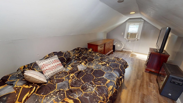 130 Syril Dr, Geneva, IL 60134 - bedroom featuring wood finished floors, cooling unit, and lofted ceiling