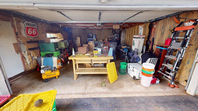 130 Syril Dr, Geneva, IL 60134 - garage featuring a workshop area and water heater