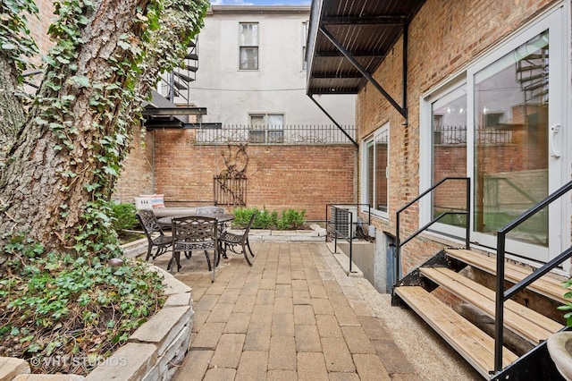 1636 N Cleveland Ave, Chicago, IL 60614 - view of patio featuring entry steps and outdoor dining area