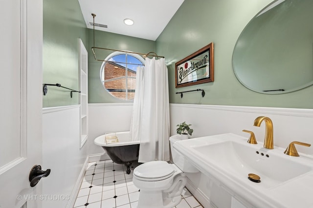 1636 N Cleveland Ave, Chicago, IL 60614 - full bathroom with a sink, toilet, and shower / bath combo with shower curtain