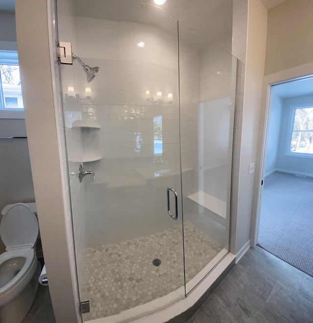 2019 Middleton Ave, Lisle, IL 60532 - bathroom with toilet, a stall shower, and baseboards