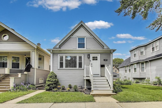 529 Circle Ave, Forest Park, IL 60130 - view of front facade featuring a front lawn and stairs