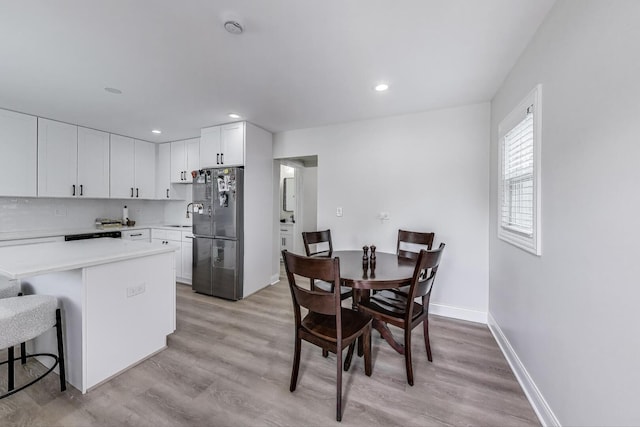 529 Circle Ave, Forest Park, IL 60130 - dining space with light wood-style flooring, baseboards, and recessed lighting