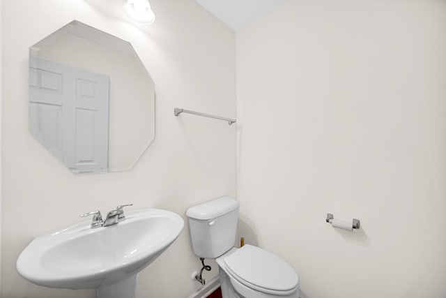 192 Owen St, Matteson, IL 60443 - half bathroom featuring a sink and toilet