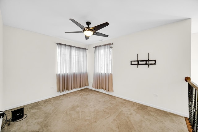 192 Owen St, Matteson, IL 60443 - empty room featuring a ceiling fan, baseboards, and carpet