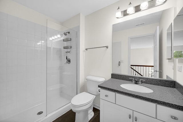 192 Owen St, Matteson, IL 60443 - full bath featuring toilet, vanity, and a tile shower