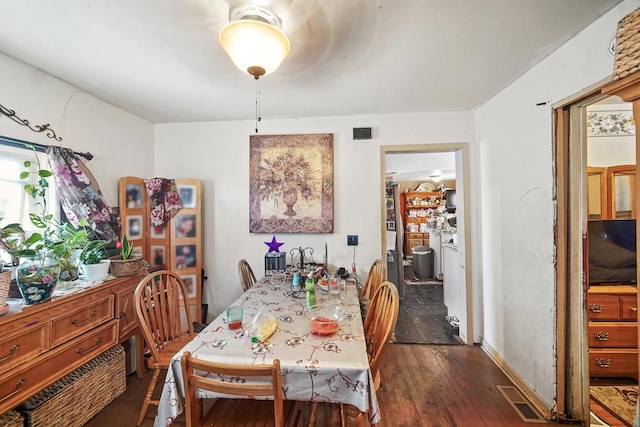 9620 S Exchange Ave, Chicago, IL 60617 - dining area featuring dark wood-style flooring