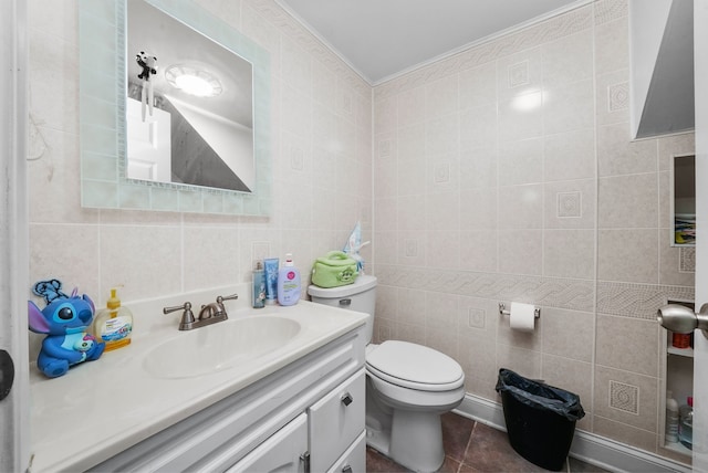 136 Anita Dr, Bourbonnais, IL 60914 - bathroom featuring tile walls, toilet, vanity, tile patterned flooring, and crown molding