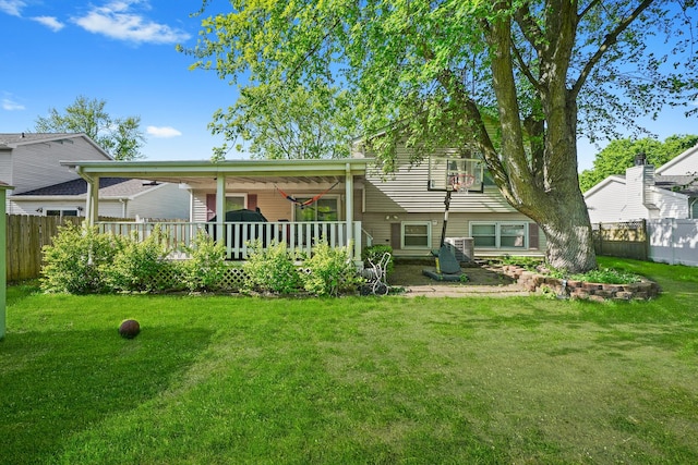 136 Anita Dr, Bourbonnais, IL 60914 - rear view of property with a wooden deck