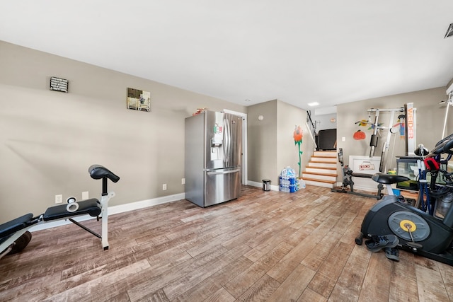 136 Anita Dr, Bourbonnais, IL 60914 - workout room with light wood-style floors and baseboards