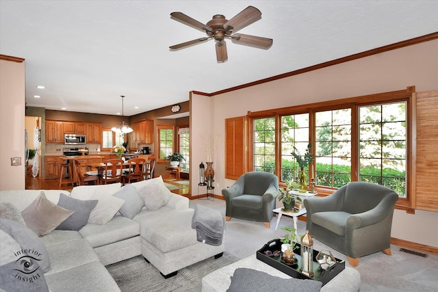 21048 Tall Grass Dr, Mokena, IL 60448 - living area featuring baseboards, ceiling fan, a chandelier, recessed lighting, and light carpet