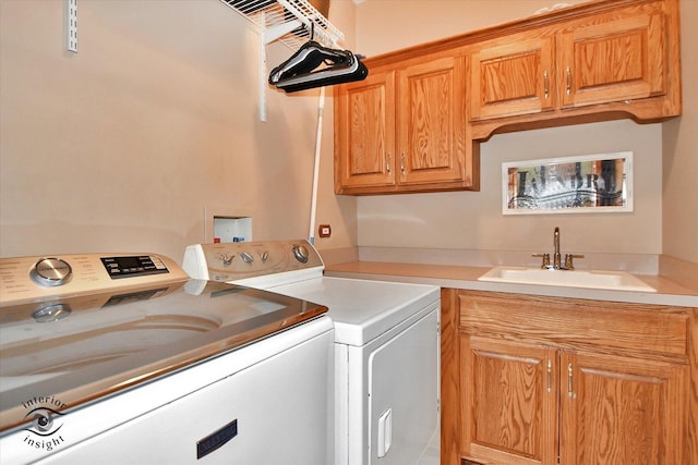 21048 Tall Grass Dr, Mokena, IL 60448 - laundry room featuring washing machine and dryer and cabinet space