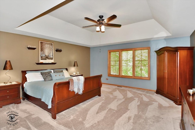 21048 Tall Grass Dr, Mokena, IL 60448 - bedroom with a tray ceiling, light carpet, baseboards, and ceiling fan