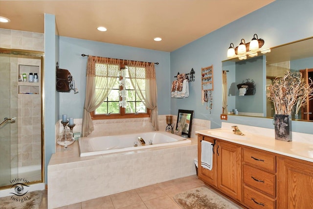 21048 Tall Grass Dr, Mokena, IL 60448 - full bathroom featuring tile patterned floors, a garden tub, a shower stall, double vanity, and recessed lighting