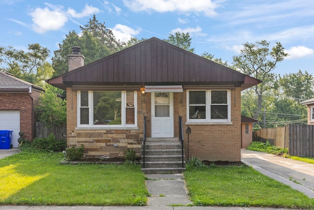4537 Fishermans Ter, Lyons, IL 60534 - bungalow-style house featuring entry steps, a chimney, and brick siding