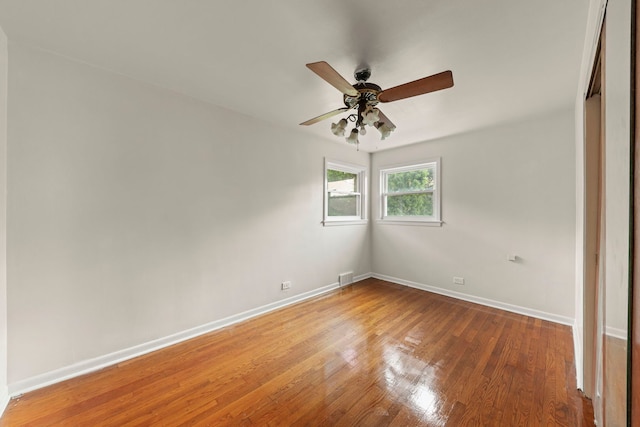 4537 Fishermans Ter, Lyons, IL 60534 - unfurnished room with wood finished floors and a ceiling fan