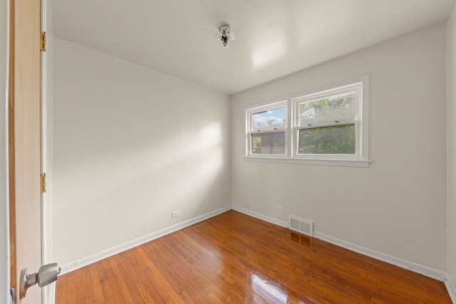4537 Fishermans Ter, Lyons, IL 60534 - spare room with light wood-style floors and baseboards