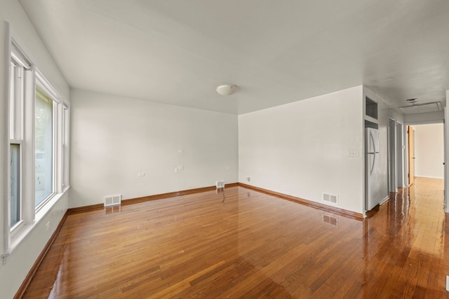 4537 Fishermans Ter, Lyons, IL 60534 - spare room with hardwood / wood-style floors and baseboards