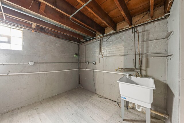 4537 Fishermans Ter, Lyons, IL 60534 - below grade area featuring a sink and wood finished floors