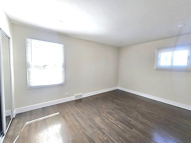 1343 E Anderson Dr, Palatine, IL 60074 - unfurnished room with dark wood-type flooring and baseboards