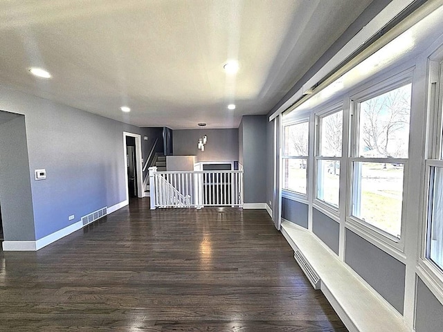 1343 E Anderson Dr, Palatine, IL 60074 - spare room featuring dark wood finished floors, baseboards, recessed lighting, and stairs