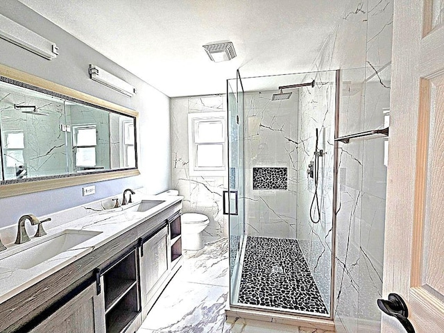 1343 E Anderson Dr, Palatine, IL 60074 - bathroom featuring marble look tile flooring, toilet, a marble finish shower, double vanity, and a textured ceiling