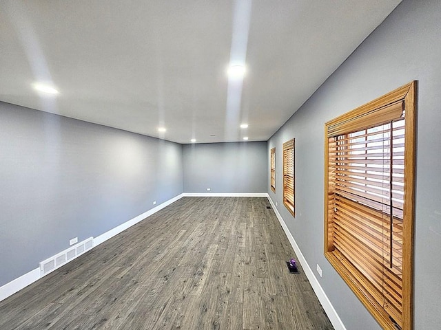 1343 E Anderson Dr, Palatine, IL 60074 - spare room featuring wood finished floors, baseboards, and recessed lighting