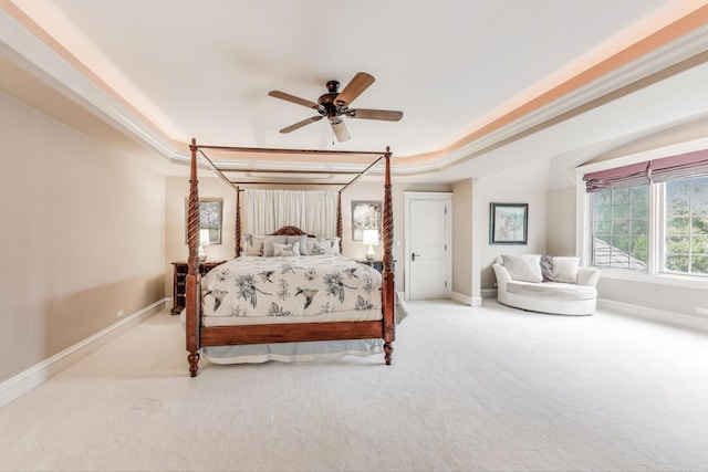 724 Becker Rd, Glenview, IL 60025 - carpeted bedroom with a tray ceiling, baseboards, and ceiling fan