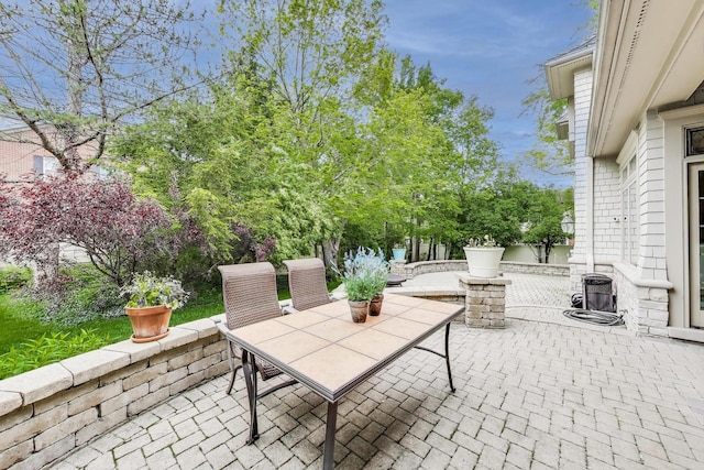 724 Becker Rd, Glenview, IL 60025 - view of patio featuring outdoor dining area