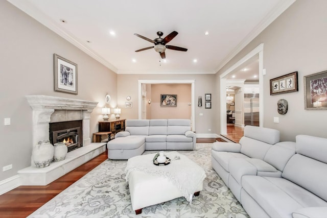 724 Becker Rd, Glenview, IL 60025 - living room featuring a ceiling fan, wood finished floors, crown molding, ornate columns, and recessed lighting