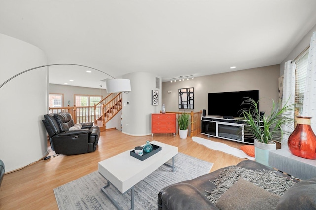 6235 S Knox Ave Unit K, Chicago, IL 60629 - living area featuring wood finished floors, stairs, and recessed lighting