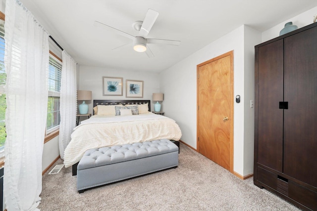 6235 S Knox Ave Unit K, Chicago, IL 60629 - bedroom with light colored carpet, baseboards, and a ceiling fan