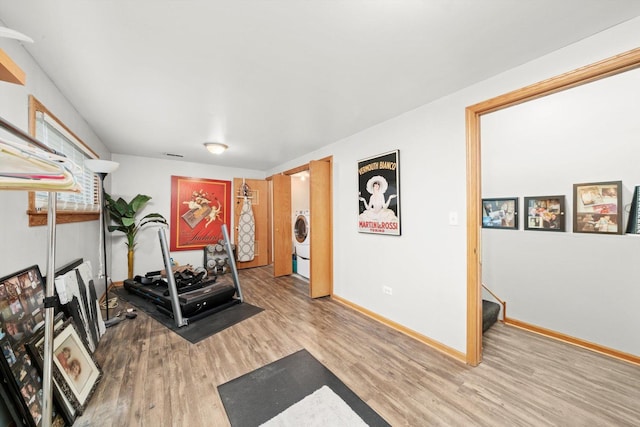 6235 S Knox Ave Unit K, Chicago, IL 60629 - workout room with wood finished floors, washer / dryer, and baseboards