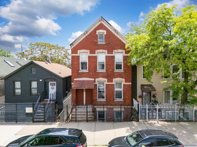 2227 W 21st St, Chicago, IL 60608 - view of property with brick siding and a fenced front yard