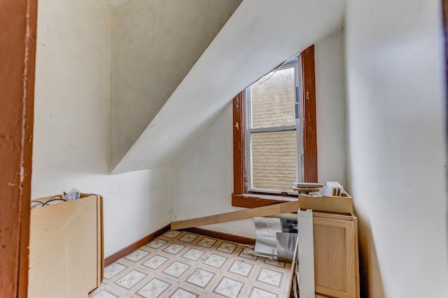 2227 W 21st St, Chicago, IL 60608 - bonus room with light flooring, baseboards, and lofted ceiling
