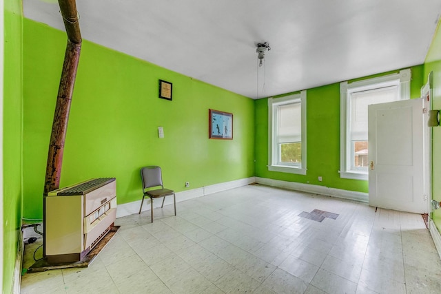 2227 W 21st St, Chicago, IL 60608 - unfurnished room featuring baseboards and heating unit