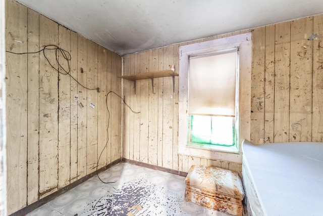 2227 W 21st St, Chicago, IL 60608 - spare room featuring wood walls and tile patterned floors
