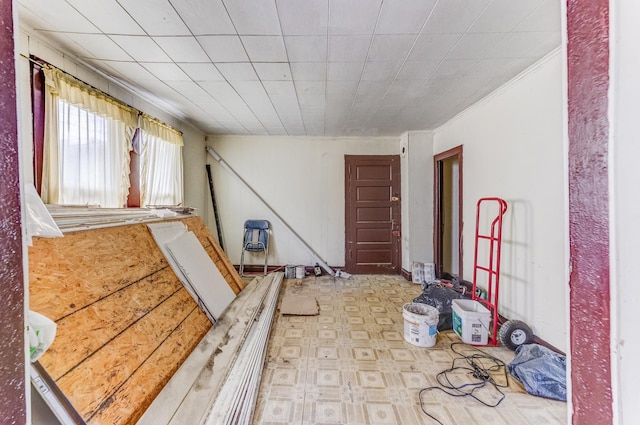 2227 W 21st St, Chicago, IL 60608 - unfurnished room featuring tile patterned floors and ornamental molding