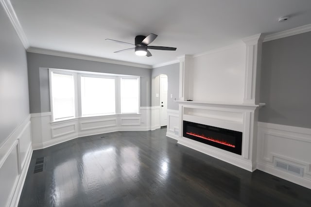 10817 S Eberhart Ave, Chicago, IL 60628 - unfurnished living room with a decorative wall, a ceiling fan, a wainscoted wall, crown molding, and a glass covered fireplace