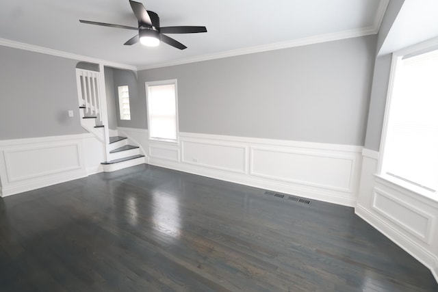 10817 S Eberhart Ave, Chicago, IL 60628 - empty room with ceiling fan, wainscoting, ornamental molding, stairway, and dark wood-style flooring
