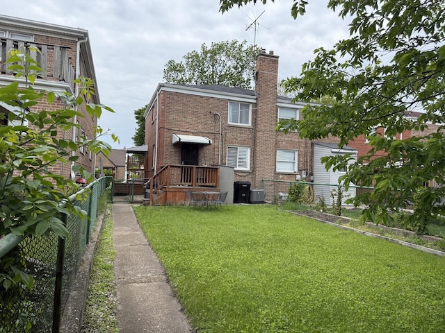 11247 S S Ave L, Chicago, IL 60617 - rear view of house with brick siding and a chimney