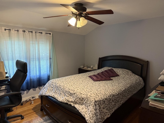 11247 S S Ave L, Chicago, IL 60617 - bedroom with light wood-style floors, a desk, lofted ceiling, and a ceiling fan