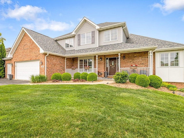11546 Ridgecrest Dr, Roscoe, IL 61073 - view of front of house with a porch, brick siding, an attached garage, and a shingled roof