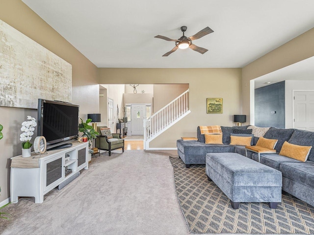 11546 Ridgecrest Dr, Roscoe, IL 61073 - living room with stairway, a ceiling fan, and carpet floors