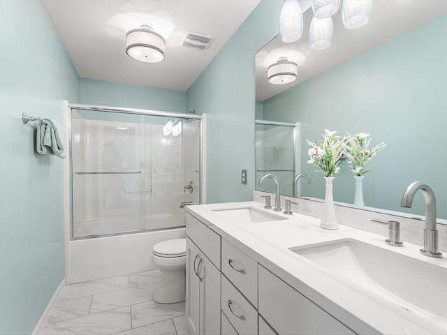 11546 Ridgecrest Dr, Roscoe, IL 61073 - bathroom featuring combined bath / shower with glass door, double vanity, and marble finish floors